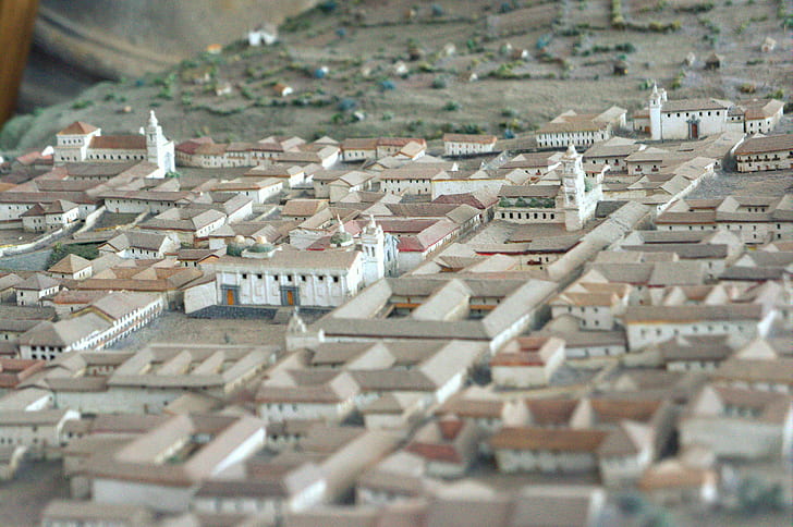 selective focus photography of village miniature