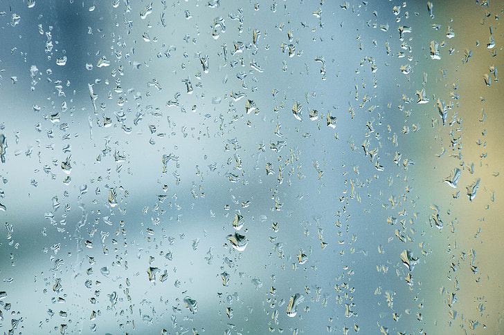 closeup photo of clear glass with water droplets