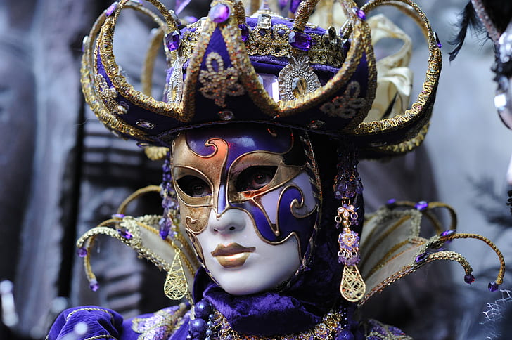 woman wears masquerade mask closeup photo