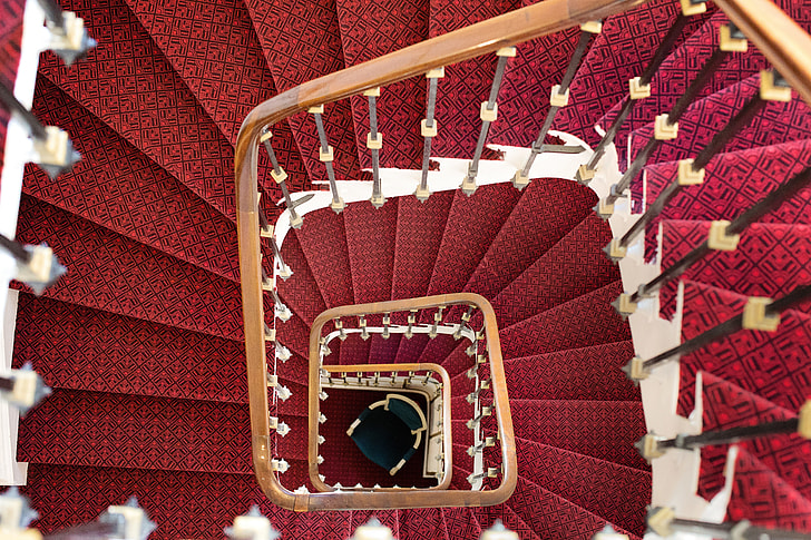 Royalty-Free photo: Red spiral stair | PickPik