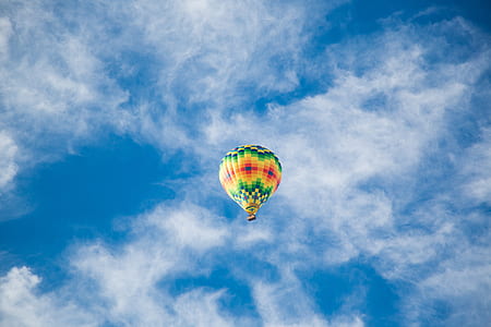 multicolored air balloon flying on sky