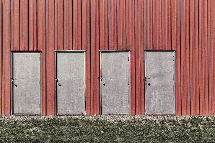 four gray metal doors