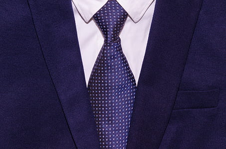 purple blazer and satin necktie