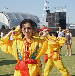 woman wearing yellow suit
