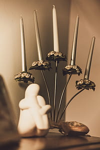 Gray Floral Candelabra on Brown Wooden Surface