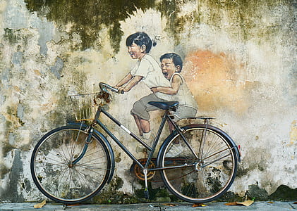 children riding bicycle painting