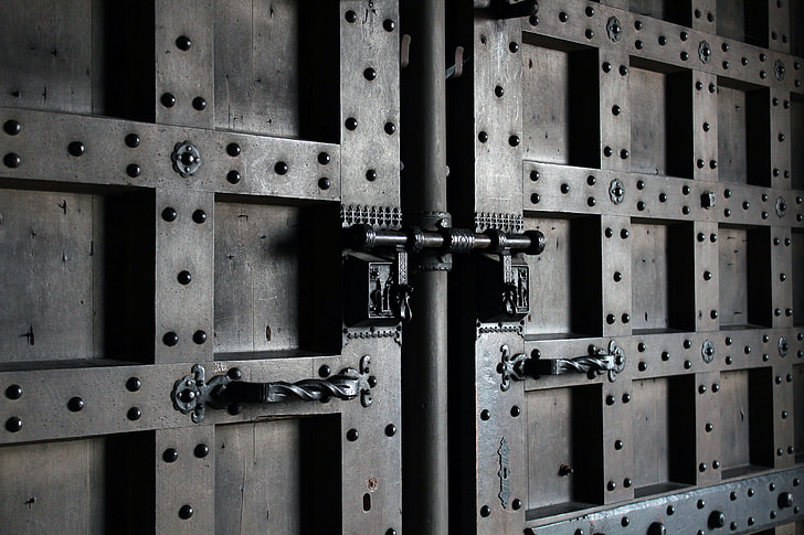 graysclae photograph of door gate lock