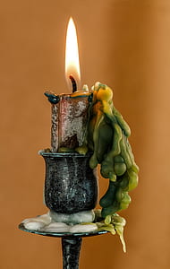 candle on metal stand