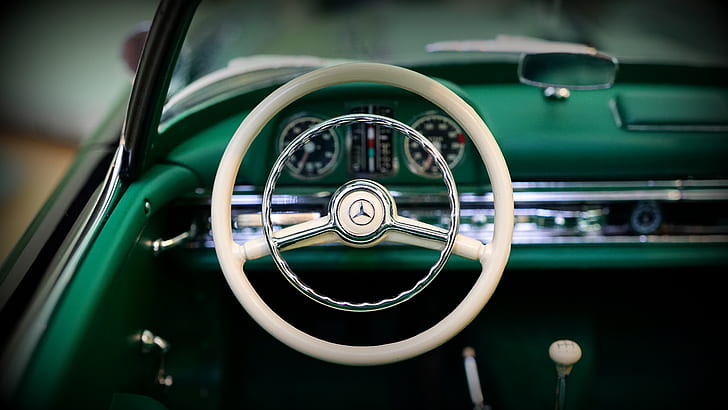 photo of white Mercedes-Benz steering wheel