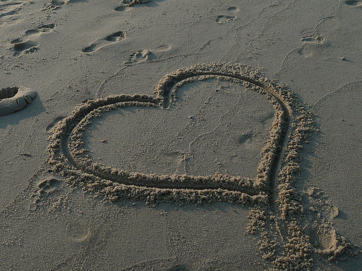 heart sand drawing during daytime
