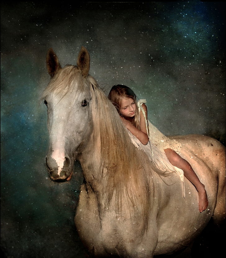 girl riding on white horse