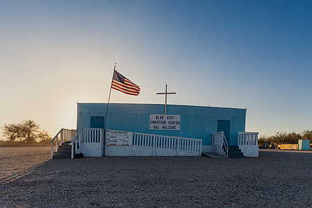U.S.A Flag near blue painted house