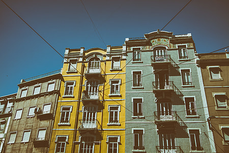 Wide angle shot of colourful buildings on the streets of Lisbon in Portugal. Image captured with a Canon DSLR