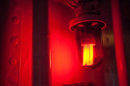 Close-up shot of on old red light at Chatham Dockyard in Kent, Southern England. Image captured with a Canon 5D DSLR