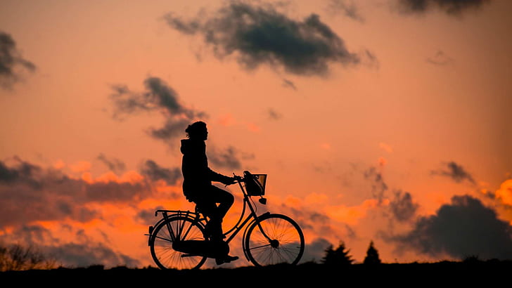 person biking silhouette