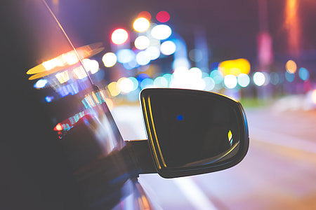 Car Side Rear-View Mirror with City Bokeh Lights