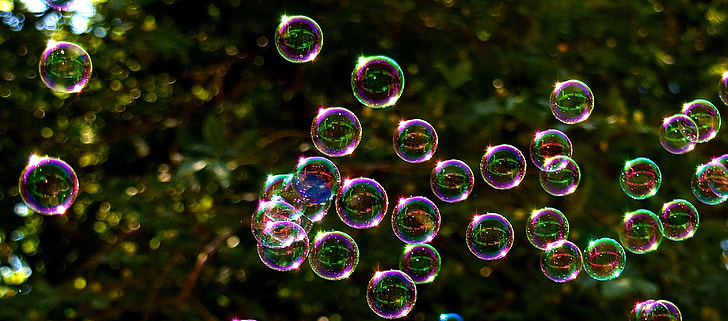 selective focus photo of bubbles at daytime