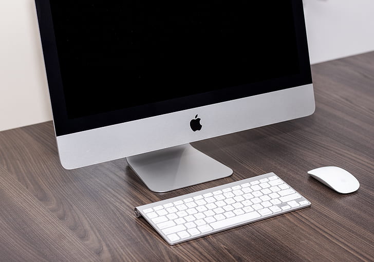 silver Imac with Apple magic keyboard and magic mouse