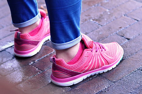 pair of pink-and-white running shoes