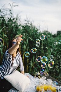 Having fun with soap bubbles in the nature