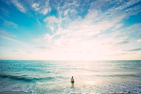 woman standing on seashore