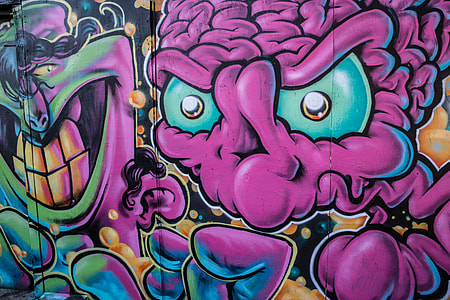 Brain street art captured on a wall in Camden