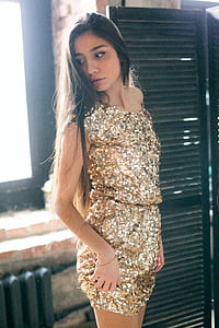 Woman Wearing Brown Sequined Sleeveless Dress