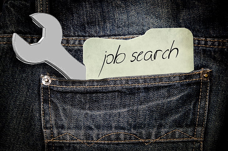 wrench on pocket with job search text overlay