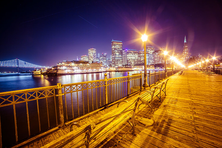 Old Pier and San Francisco Skyline with Bay Bridge at Night