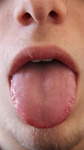 person showing tongue