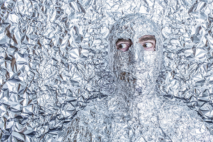 person covered with foil