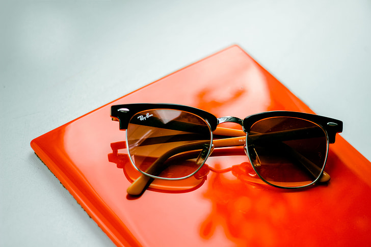 Sunglasses sitting on office table