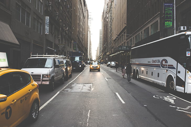 photo of New York road with yellow taxi