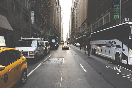 photo of New York road with yellow taxi