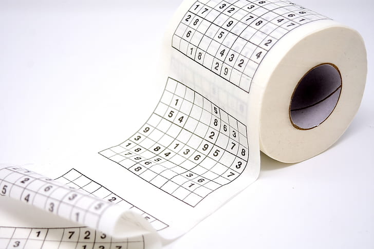white and black Sudoku-printed tissue paper