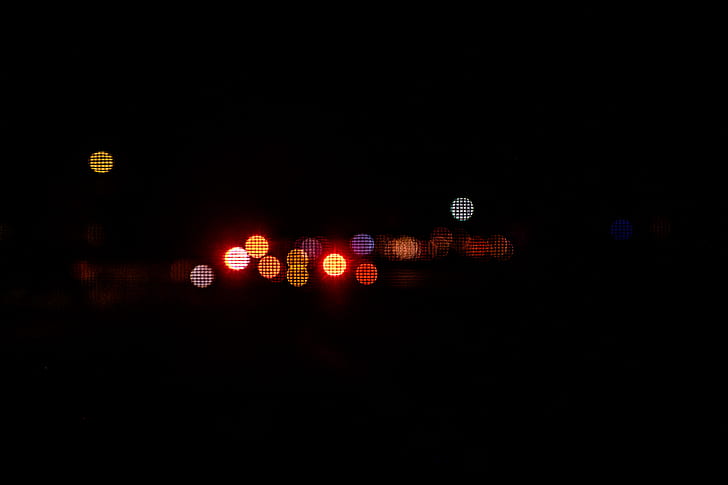 bokeh photography of red light