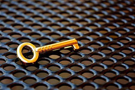 gold-colored skeleton key
