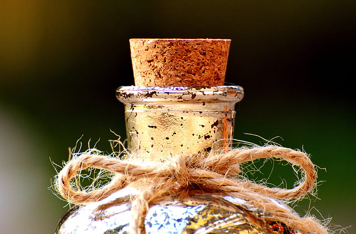 brown and yellow decorative jar