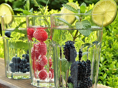 clear drinking glasses filled with fruits