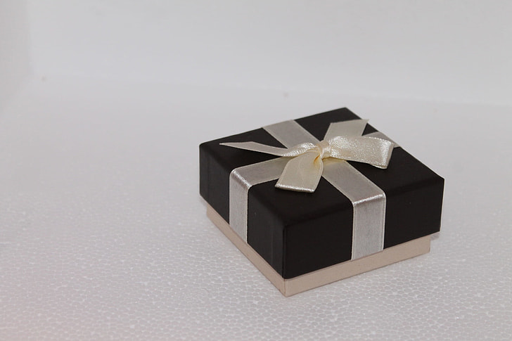 black and gray box with bow