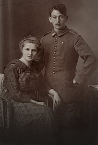 grayscale photo of man and woman