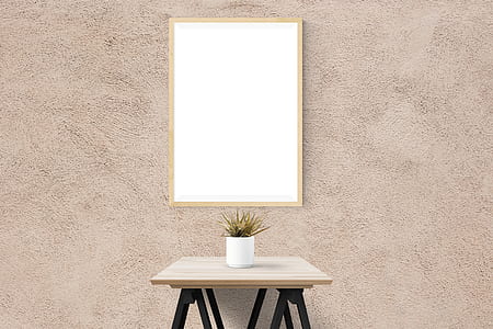 white wooden framed mirror and brown wooden console table