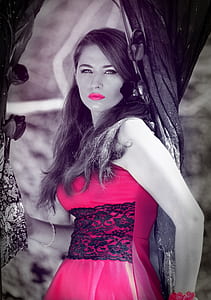 selective color photography of woman wearing red top