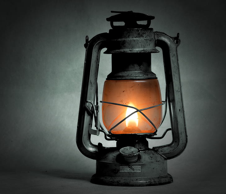selective photography of kerosene lantern