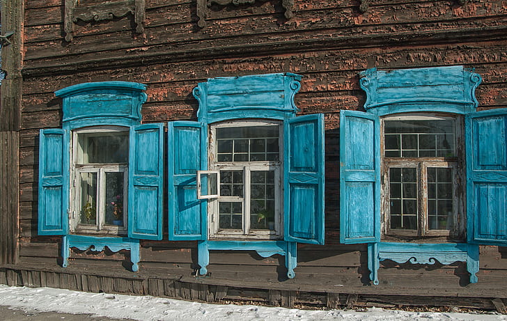 three blue wooden windows