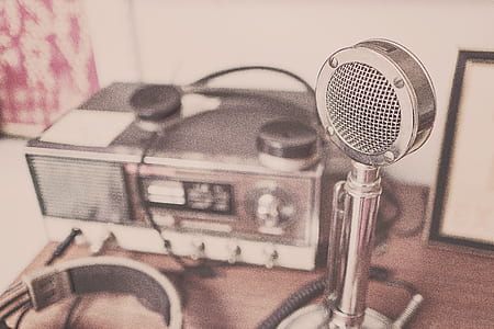 photo of stainless steel microphone near radio