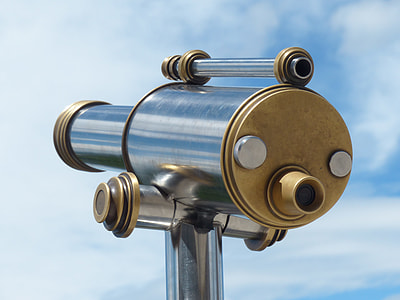 closeup photo of gold-colored scope
