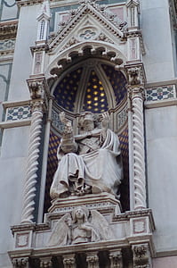 Ornate Statue of Person in Robes