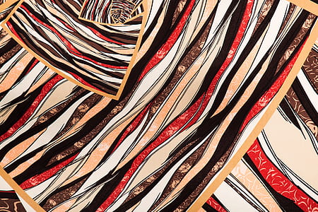 red, brown, and black abstract painting