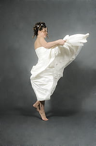 woman wearing white strapless dress